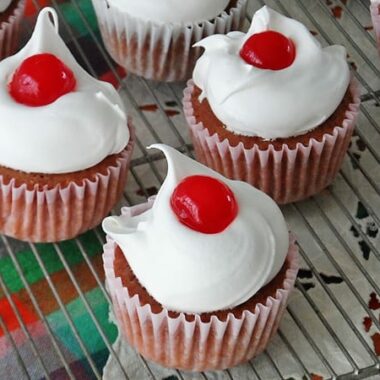 A close up photo of three ingredient cherry cupcakes.