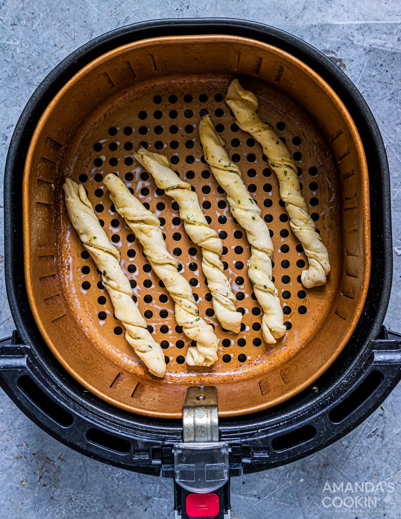 garlic parmesan twists in air fryer basket