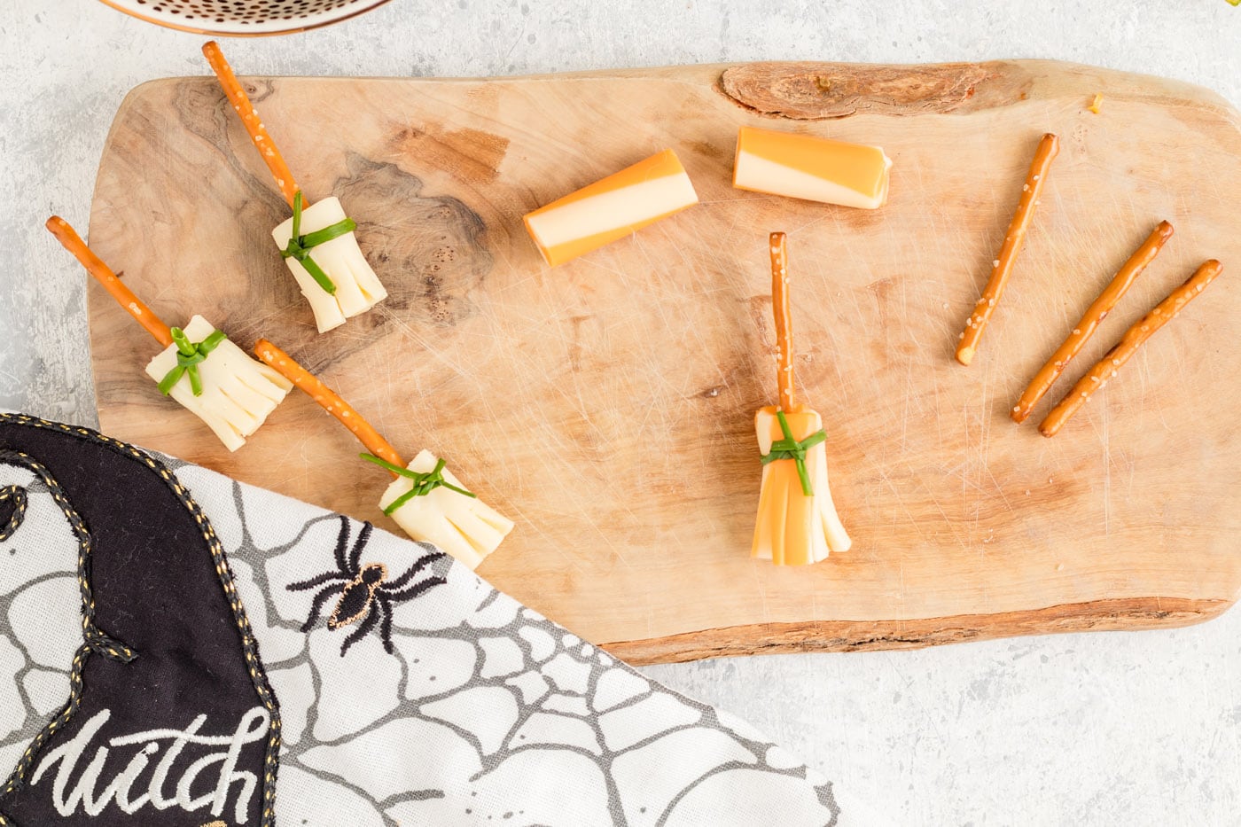 cheese and pretzel broomsticks for halloween