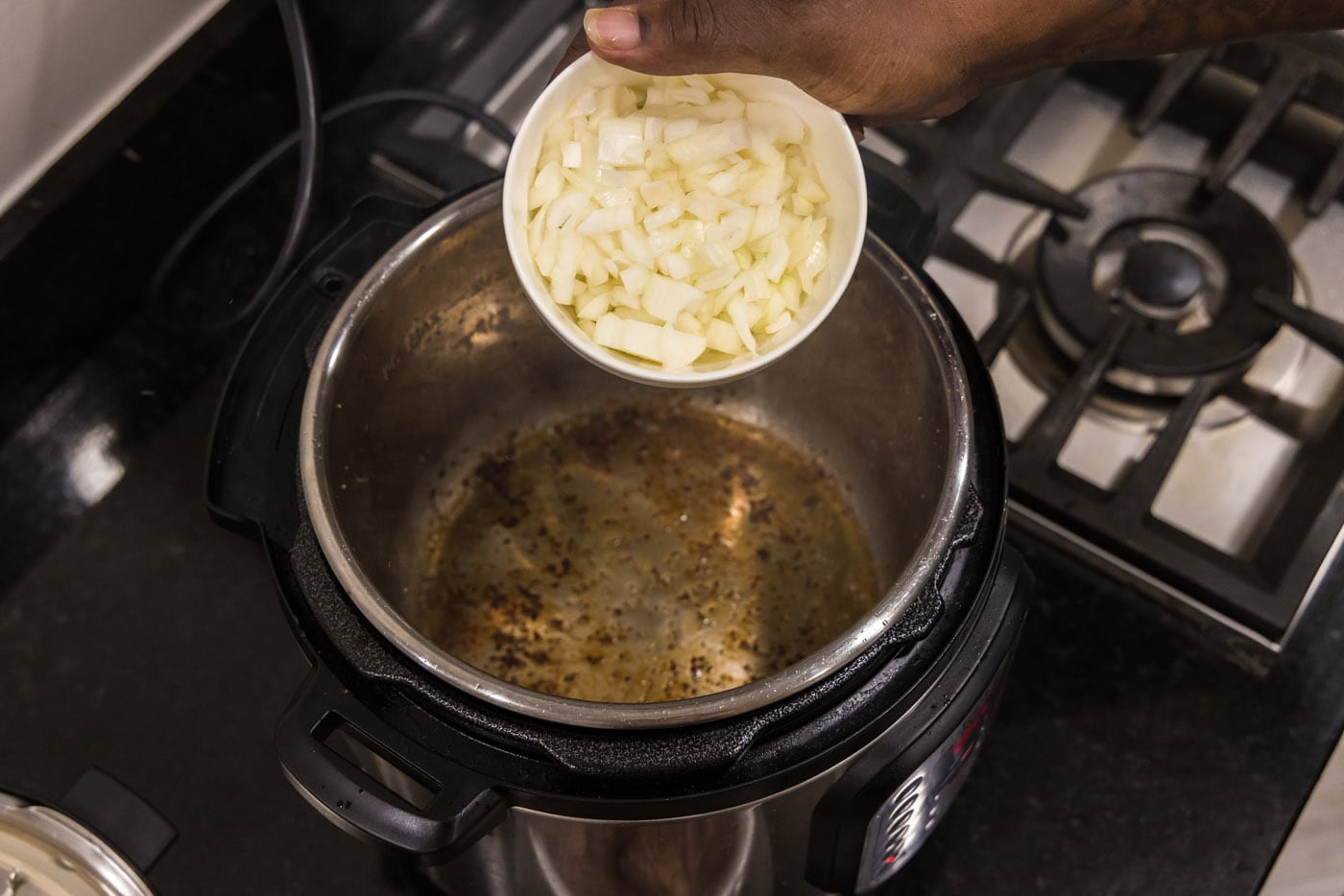 adding chopped onion to instant pot