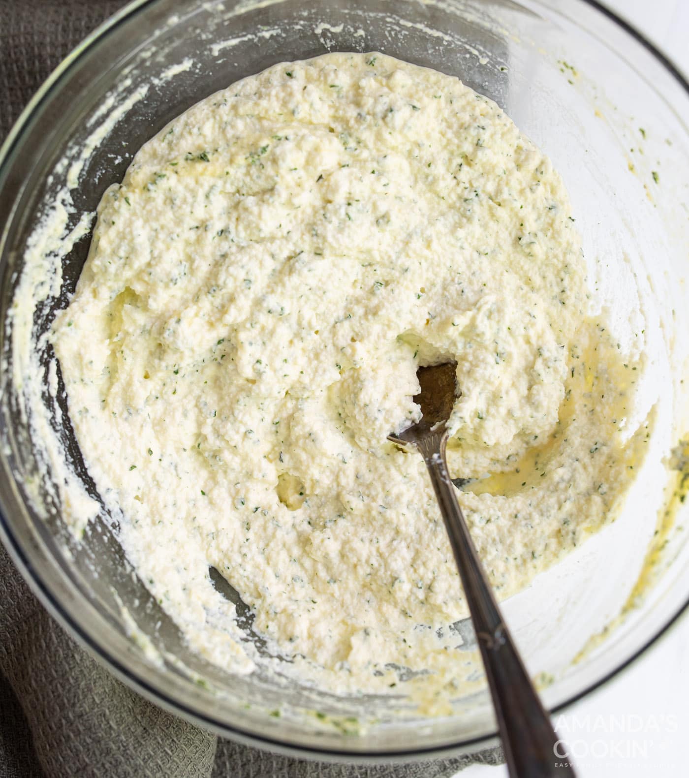 ricotta, egg, and parsley mixed in a bowl
