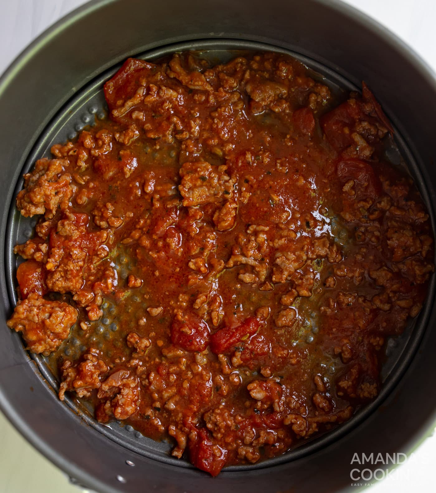 meat sauce in springform pan
