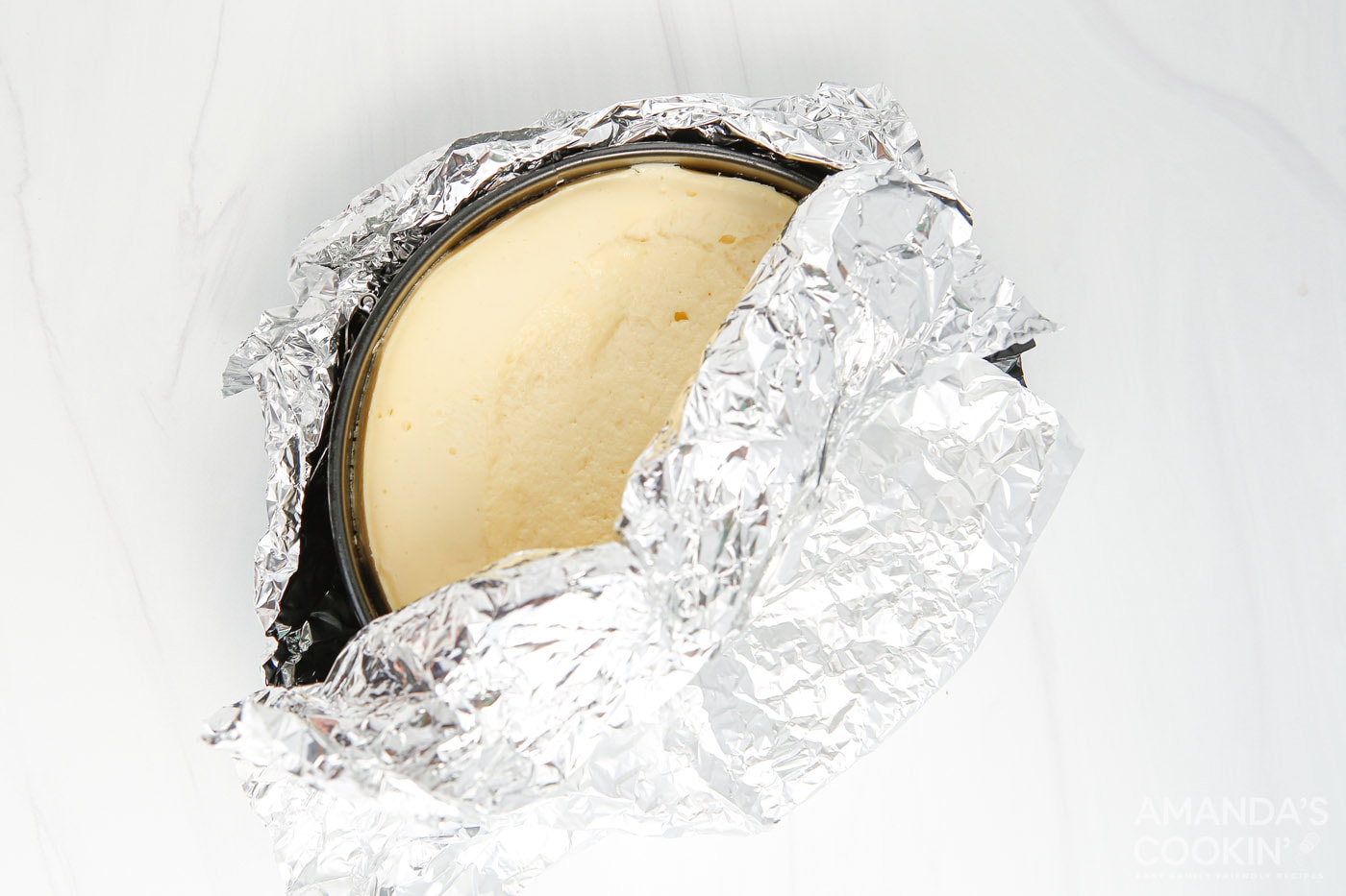 cheesecake wrapped in aluminum foil