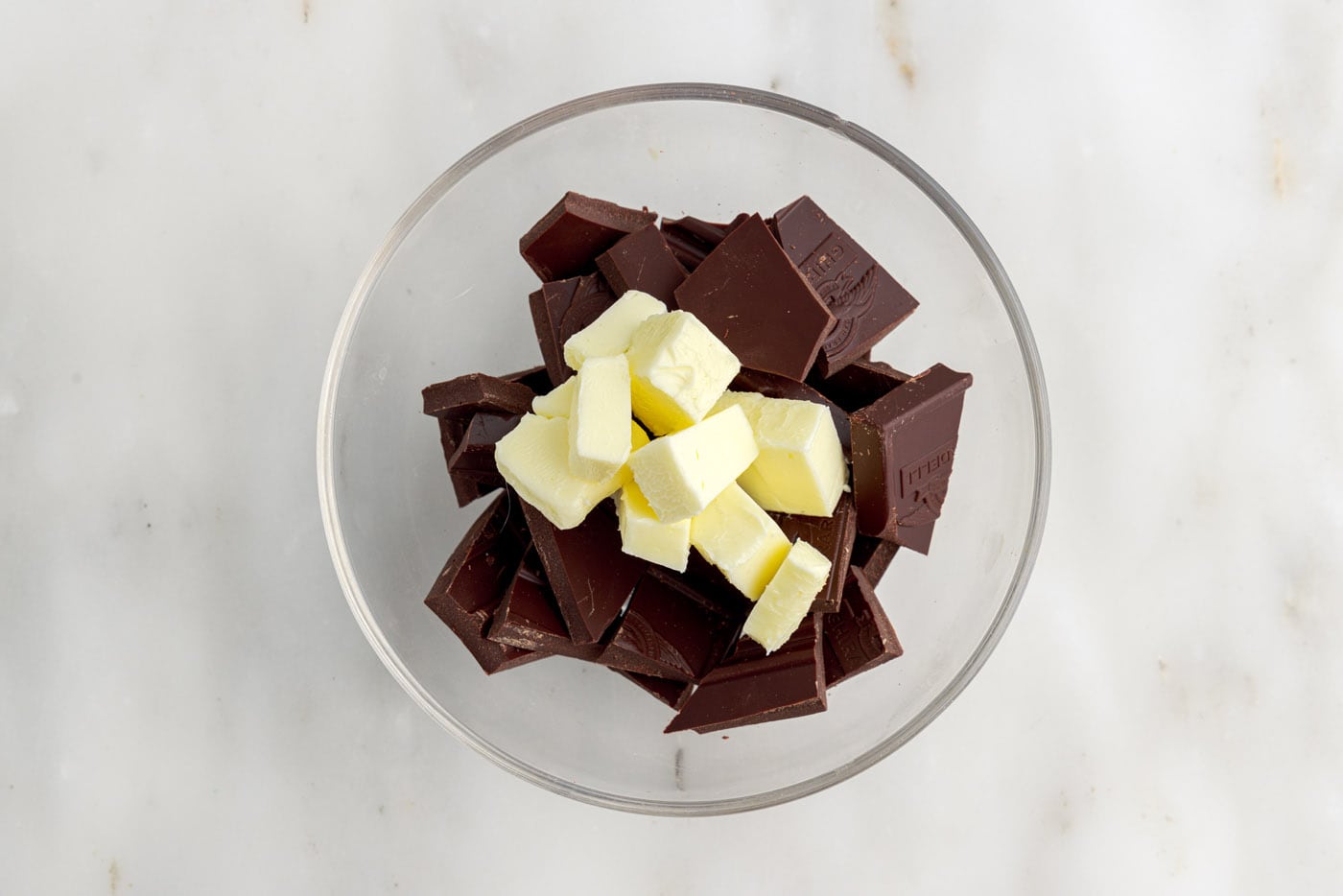 chopped chocolate and butter in a bowl